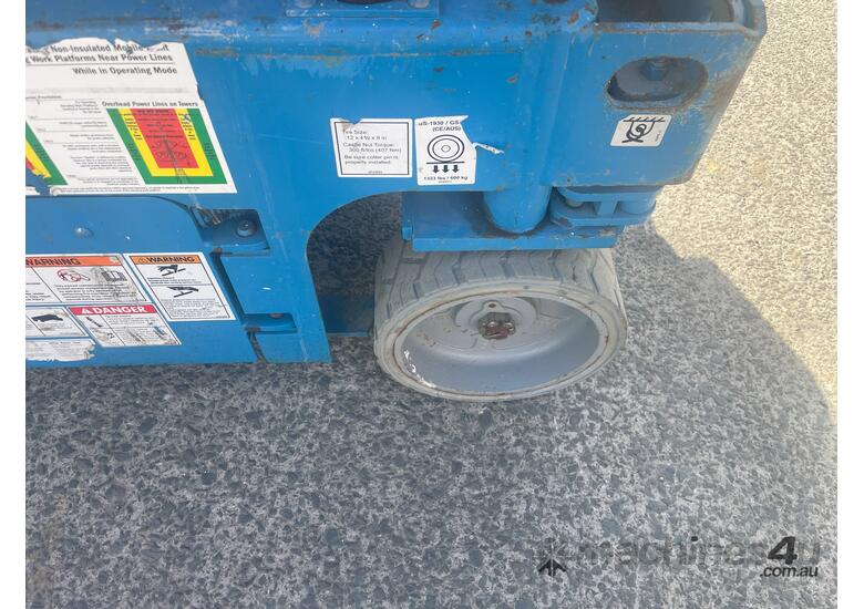 caption GENIE USED 19FT ELECTRIC SCISSOR LIFT