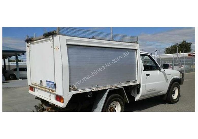 caption 2009 NISSAN Patrol GU 6 MY08 DX 2 Door Ute