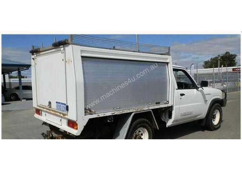 caption 2009 NISSAN Patrol GU 6 MY08 DX 2 Door Ute