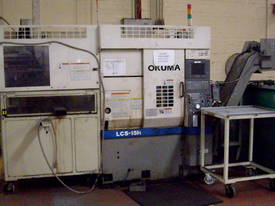 CNC Lathe with Axo Robot Feeder & Swarf Conveyor - picture0' - Click to enlarge