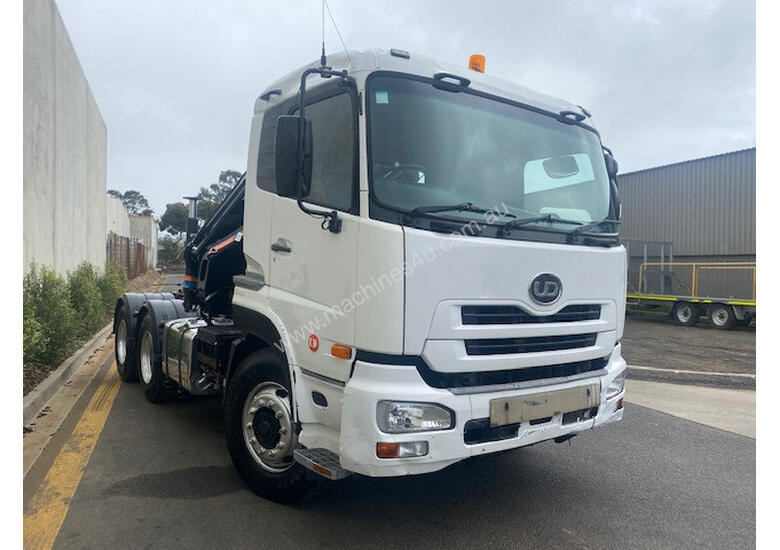 caption Nissan UD Crane Truck Truck