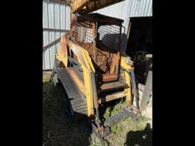 Bucket in new condition and burnt out posi-trac  - picture1' - Click to enlarge