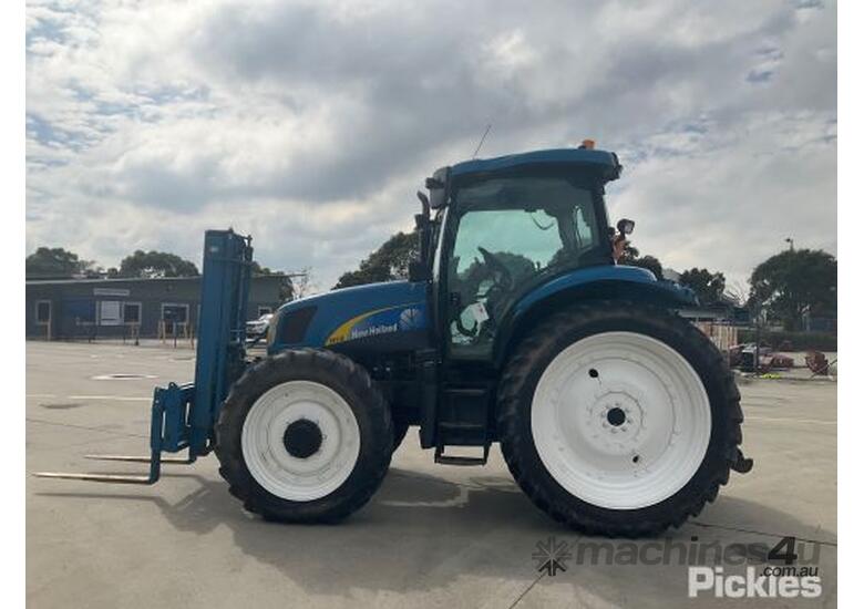Used New Holland TS110A Tractor With Front End Loader in , Listed on