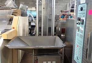 Inil Cap Feeder: Automated Bottle Cap Feeding for Beverage Production!