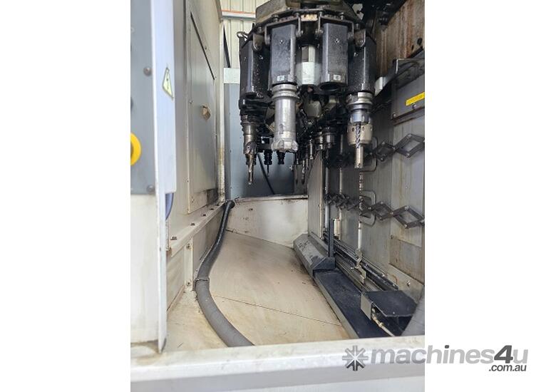 OKUMA GENOS M560V VERTICAL MACHINING CENTRE INCL 4TH AXIS