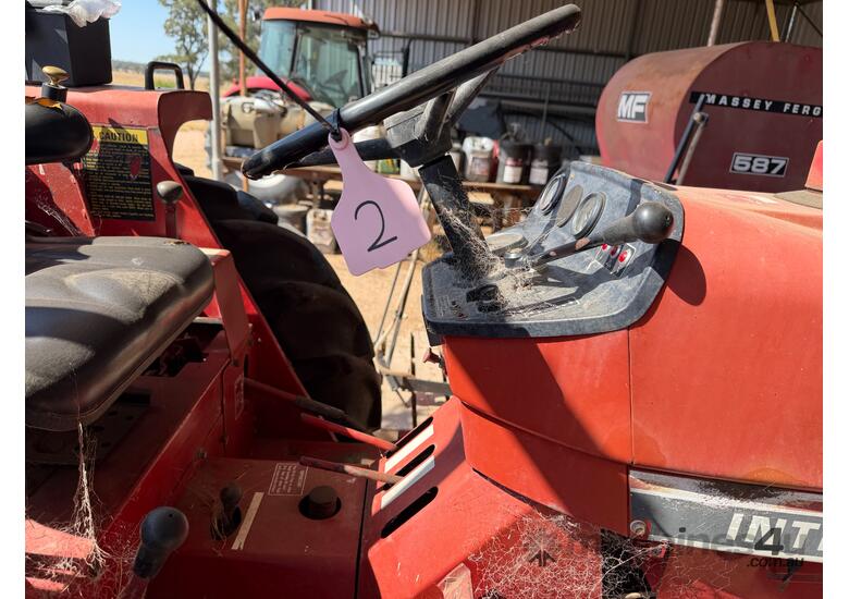 International 383 tractor with forks stick rake and blade