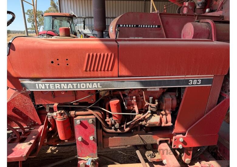 International 383 tractor with forks stick rake and blade