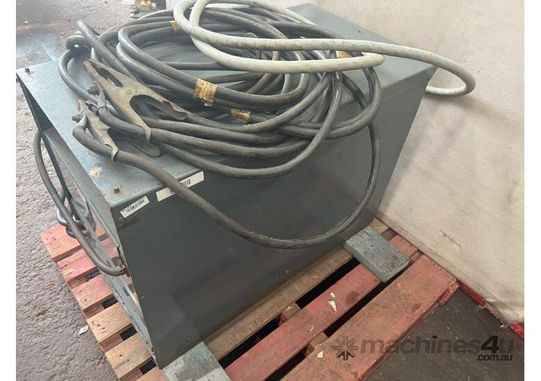 caption Lincoln DC-600 sub arc welder power source with leads/cables.