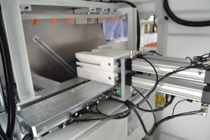 caption FOM AUTOMATIC MACHINING AND CUTTING LINE