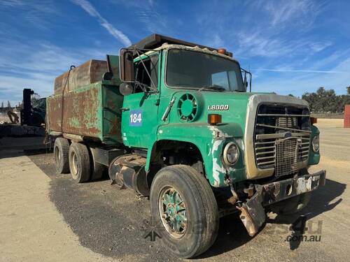 caption Ford L8000 Tipper with Water Tank