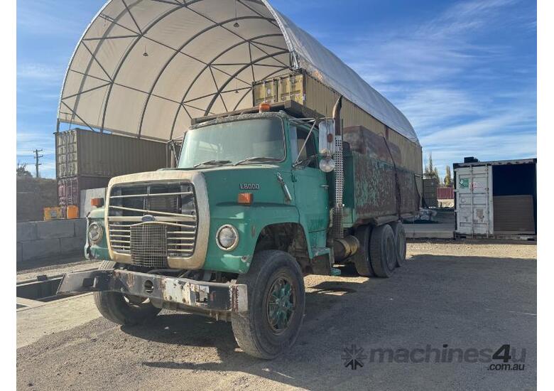 caption Ford L8000 Tipper with Water Tank