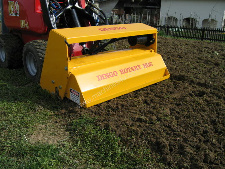 caption NEW DINGO MINI LOADER ROTARY HOE