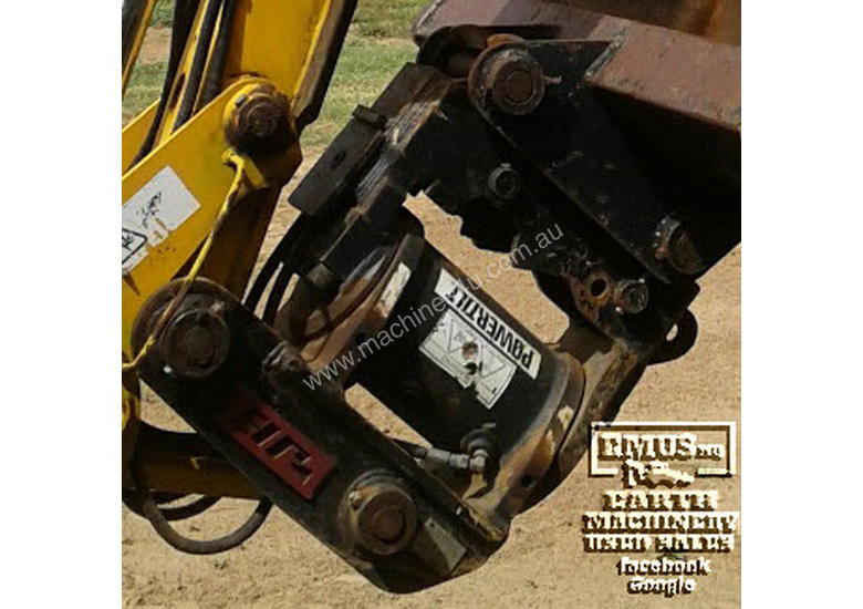 caption JB Tilt Hitch, off 3CX Backhoe, 90 to 90-degree. EMUS NQ