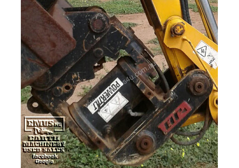 caption JB Tilt Hitch, off 3CX Backhoe, 90 to 90-degree. EMUS NQ