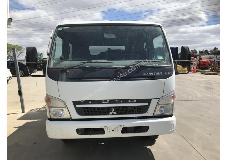 caption 2009 Mitsubishi Fuso Canter Duel Cab Tipper
