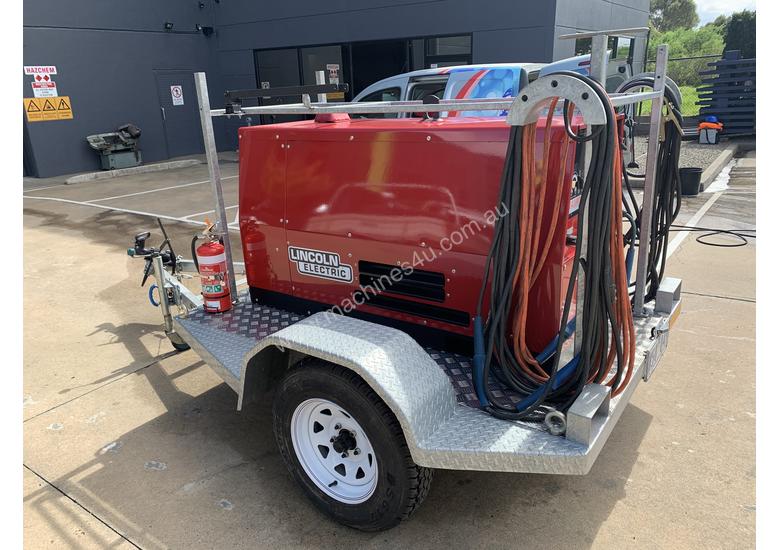 caption Lincoln Electric Weldanpower 350+ Welder and generator 3 phase. Trailer Included