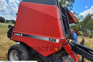 (5825) Case 528 Crop cutter round baler (Echuca, VIC)