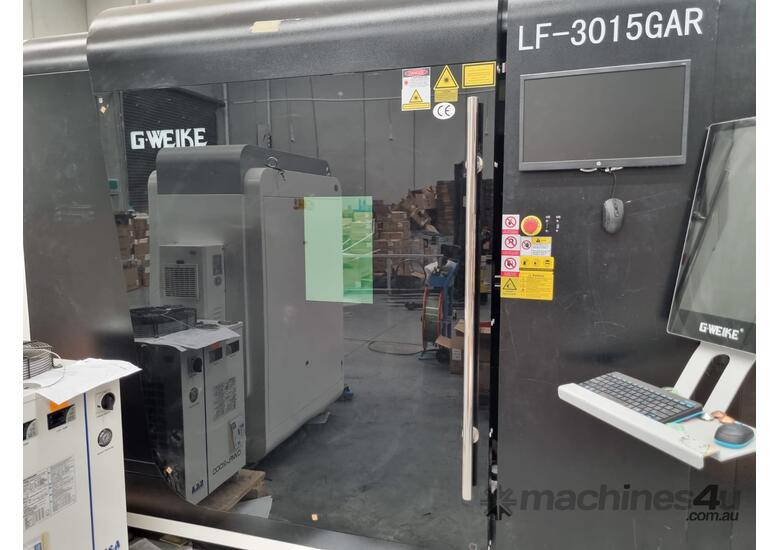 caption Fiber Laser Cutter Machine LESS THAN 100 HOURS USE! Gweike 2kW LF-3015GAR IPG Sheet and Tube Cutter