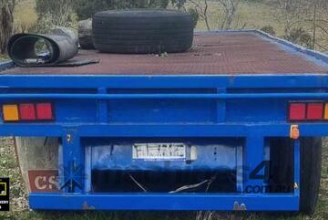 1985 Fruehauf Tri Axle Flat Top Trailer, E.M.U.S TS906 1985 Fruehauf Tri Axle Flat Top Trailer, E.M.U.S TS906