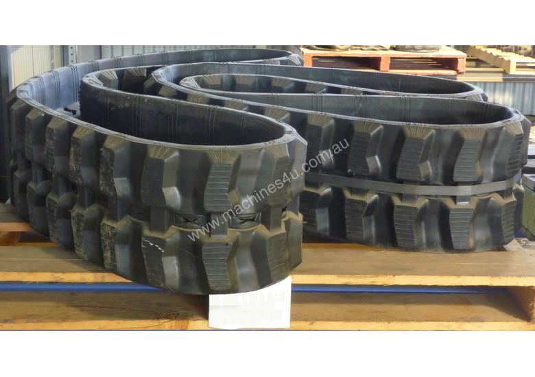 caption Komatsu PC50/PC60/PC75 Excavator Rubber Tracks