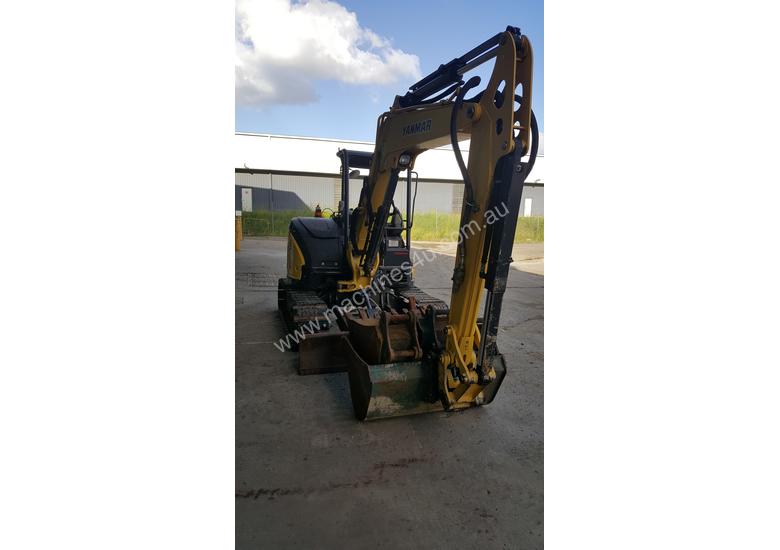 caption Used Yanmar VIO55-6B Open Cab Excavator, With Full Set of Buckets, Quick Hitch, Steel Tracks & Bolt