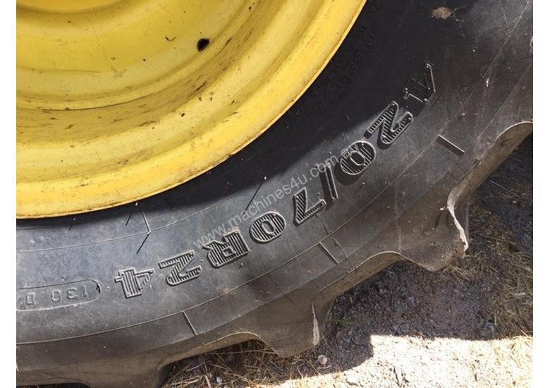caption John Deere 6105M FWA/4WD Tractor