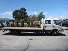 2010 Hino 300 4x2 Dual Cab Flat Bed Truck - picture0' - Click to enlarge