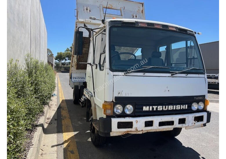 caption Mitsubishi FK417 Tipper Truck