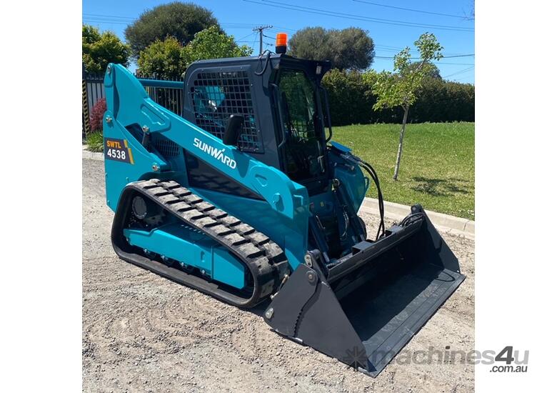 caption LYNFIELD MINI X - SUNWARD 4538 TRACKED SKID STEER - POWER AND PERFORMANCE - KUBOTA ENGINE - SAVE $5