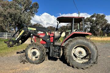 CASE CX60 TRACTOR WITH FRONT END LOADER.