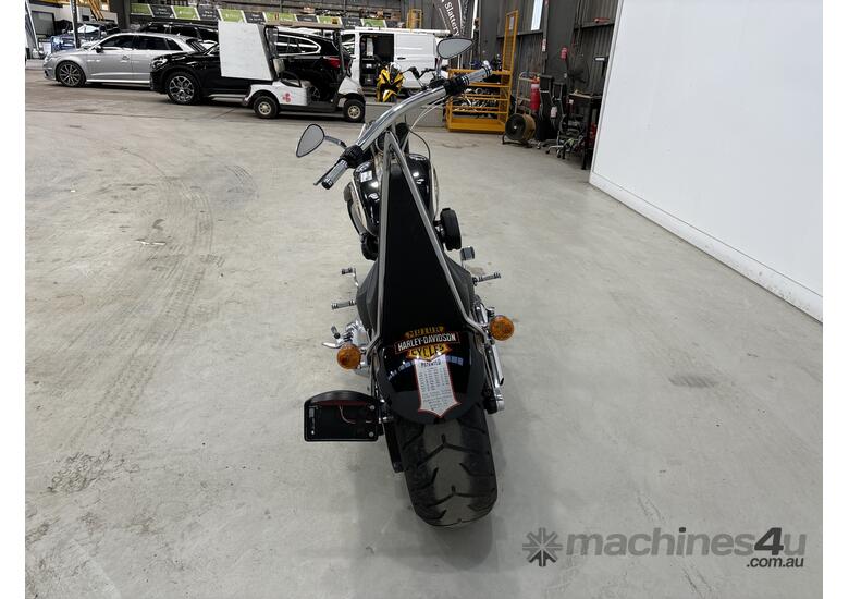 caption 2013 Harley-Davidson Rocker C Motor Cycle
