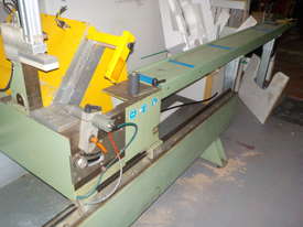 Double miter saw/ lightly used / Urban Rapid of 2004 - picture2' - Click to enlarge