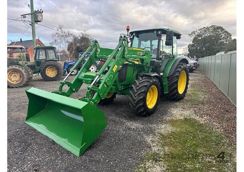 caption 2022 John Deere 5090M Utility Tractors