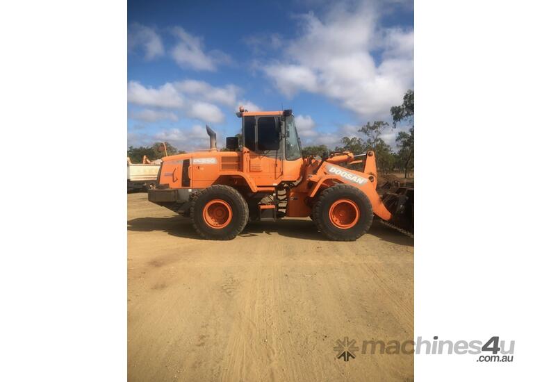 caption Doosan DL250 Front End Loader - GP bucket, Forks, Crane Jib, Stick Rake and Blade Optional