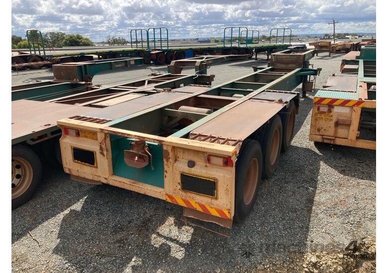 caption 1990 Howard Porter Tri Axle Drop Deck Skel Trailer