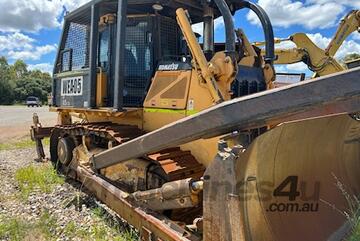 2010 KOMATSU D65EX-16 DOZER WITH GUARDING & RAKE
