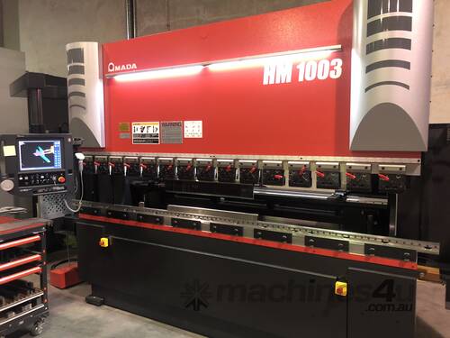 Amada HM1003 Press Brake - Offers performance and reliability with offline programming capability.