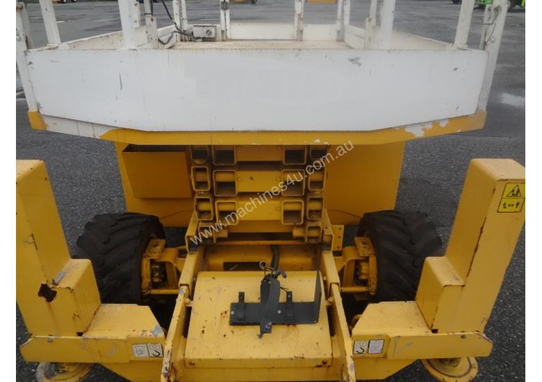 caption JLG 260MRT 4 Wheel drive, diesel scissor lift