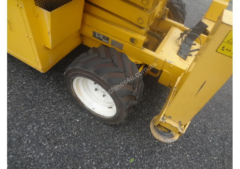 caption JLG 260MRT 4 Wheel drive, diesel scissor lift