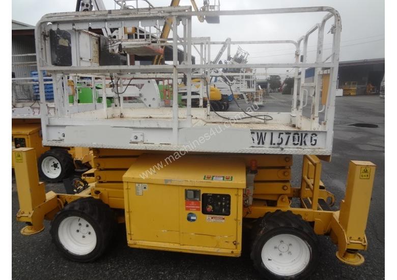 caption JLG 260MRT 4 Wheel drive, diesel scissor lift
