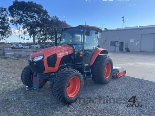 caption 2021 KUBOTA M5111 with a Howard Finishing Mower TR