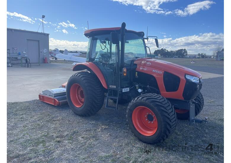 caption 2021 KUBOTA M5111 with a Howard Finishing Mower TR
