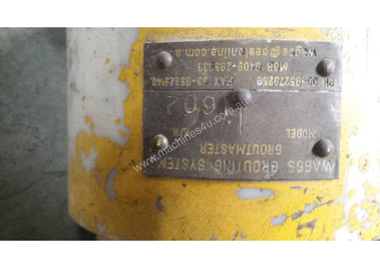 caption GROUT PUMP AND MIXER