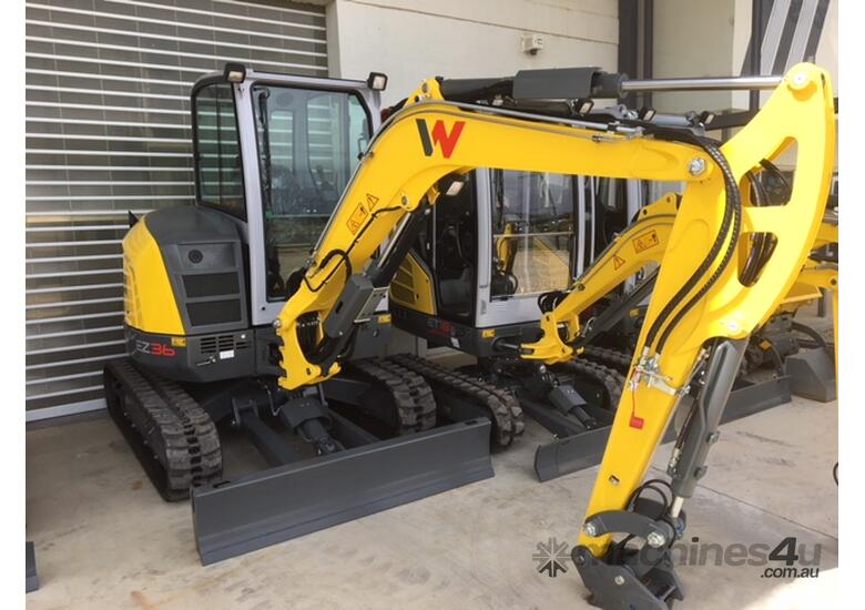 caption NEW EZ36 CABIN EXCAVATOR
