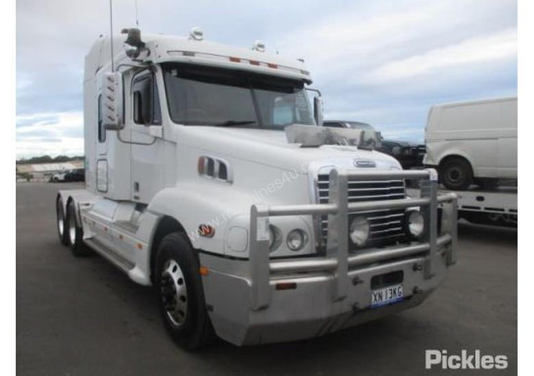 caption 2010 Freightliner Century Class CST120