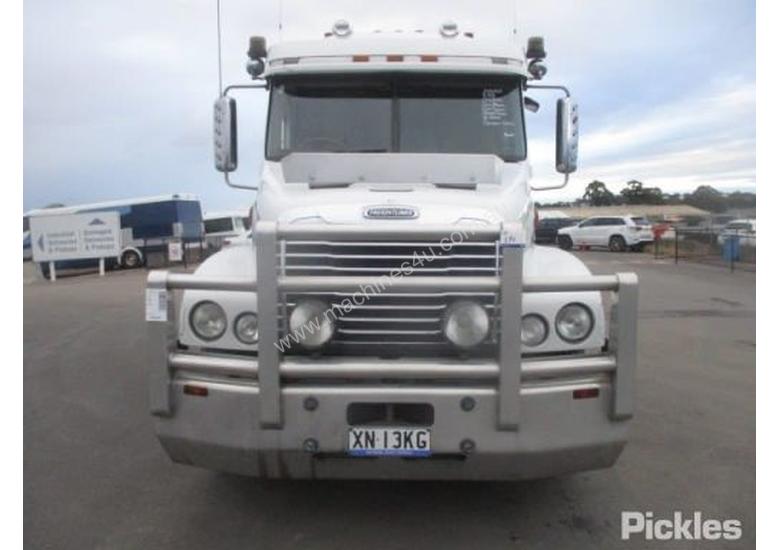 caption 2010 Freightliner Century Class CST120