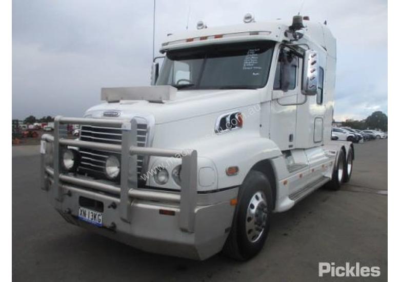 caption 2010 Freightliner Century Class CST120