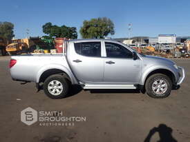 2009 MITSUBISHI TRITON 4X4 DUAL CAB WELL BODY UTE - picture0' - Click to enlarge