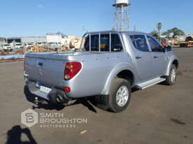 2009 MITSUBISHI TRITON 4X4 DUAL CAB WELL BODY UTE - picture0' - Click to enlarge