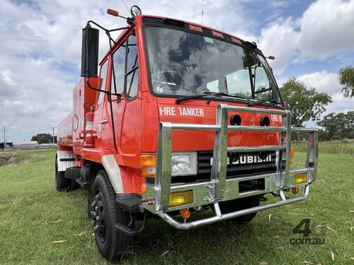 GRAND MOTOR GROUP - Mitsubishi FM515 4x2 7000 Litre Fire Tanker Truck. Ex NSW Rural Fire Service.